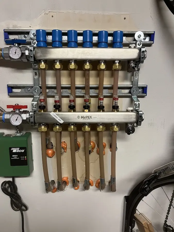 Plumber performing Gas Leak Detection at a residential property in Dandridge