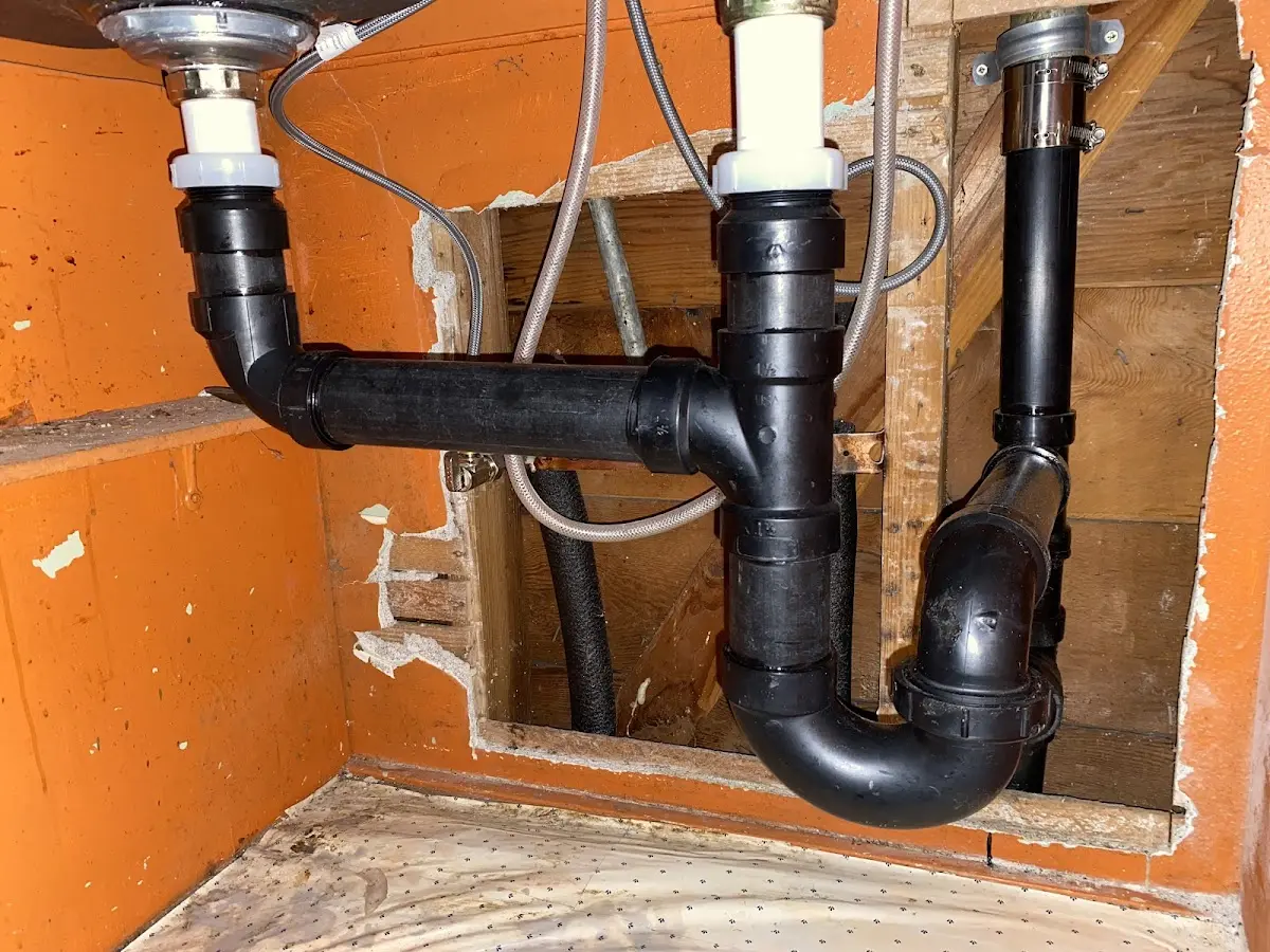 Professional Garbage Disposal Repair equipment and tools on the job in Dandridge